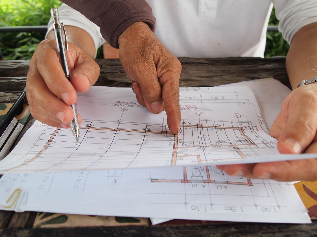 Website sitemap and page-planning notes arranged on a desk